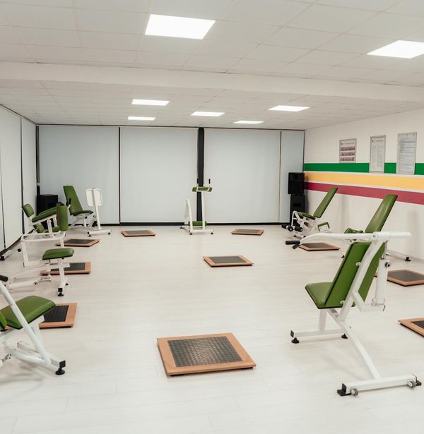 Clean minimalist gym interior with warm lighting